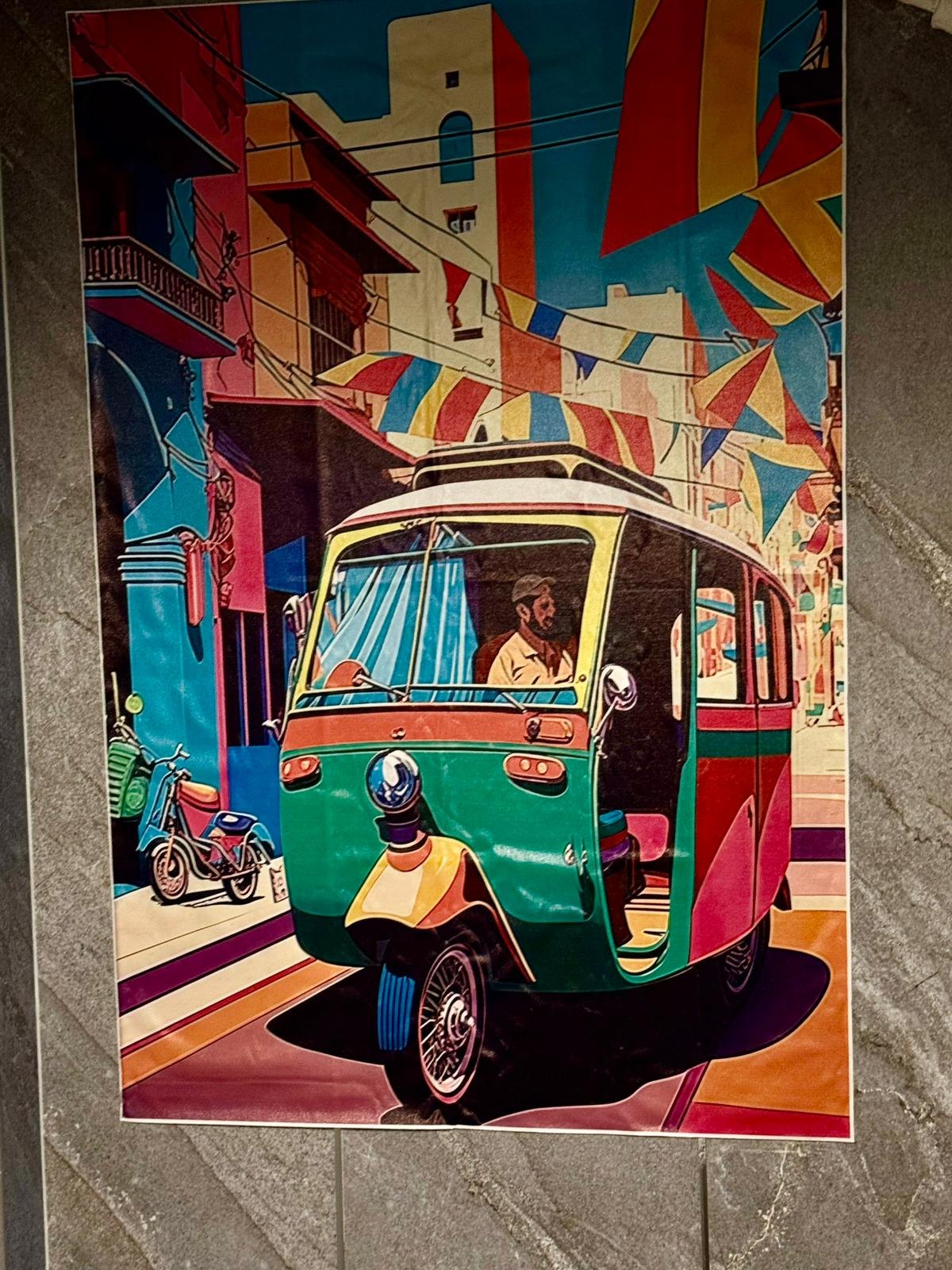 Colourful painting of an Indian auto-rickshaw on a festival street, hanging in the restaurant